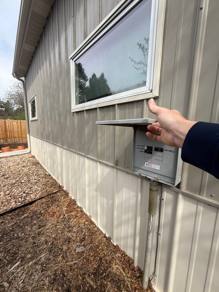 An electrical disconnect on the side of his home where we could possibly tap into for the new ductless LG RED mini splits.
