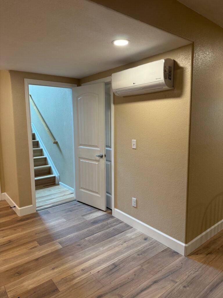 Bart's new ductless LG RED cold climate wall mount unit mounted in his basement.