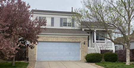 the front of chris's home in aurora.