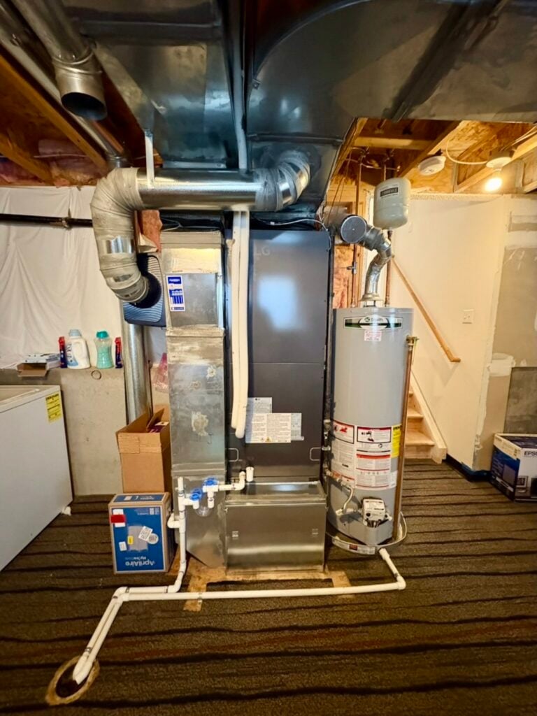 the new lg red indoor air handler installed where the old natural gas furnace was