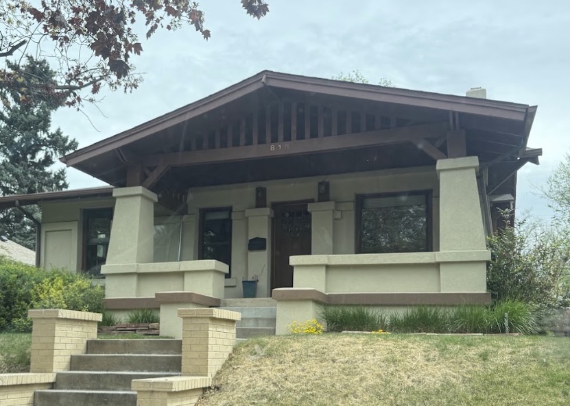 Front exterior of a 1920s Craftsman bungalow home before heat pump installation