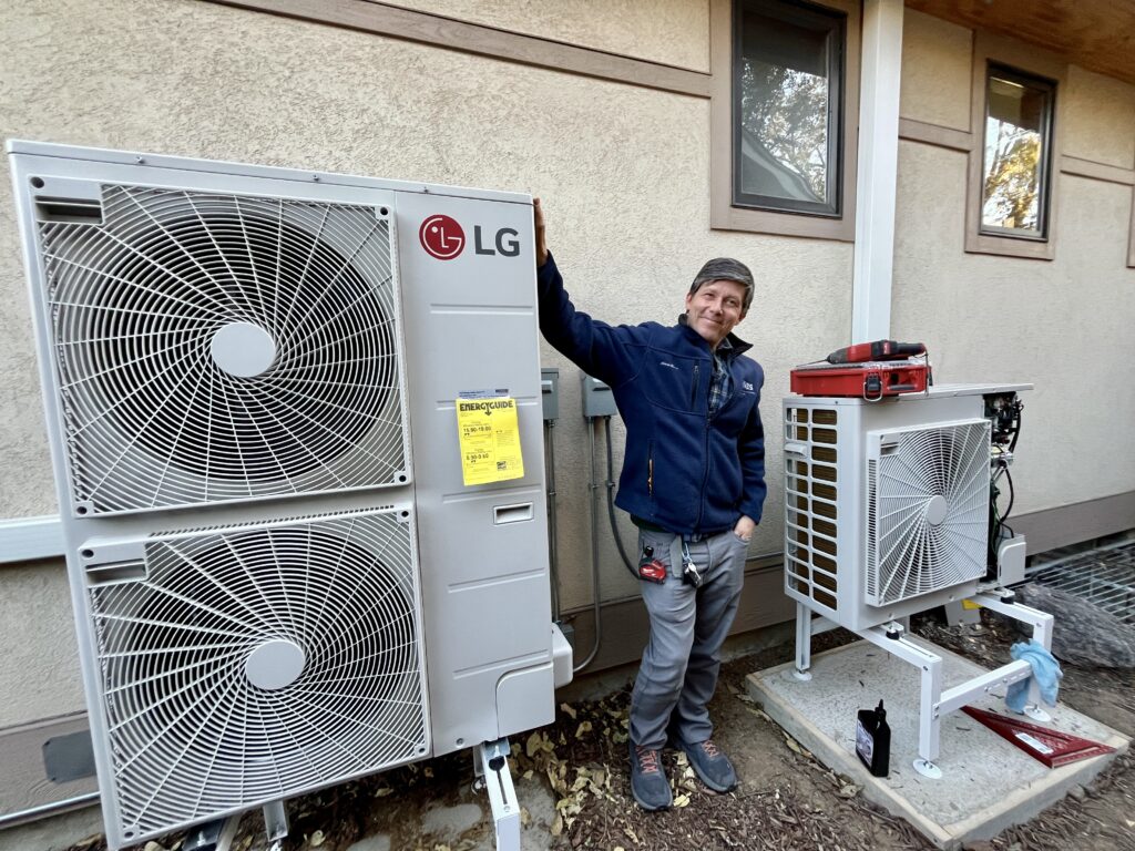 Xerxes next to a 4 ton and 2 ton LG RED cold climate heat pump in Park Hill Denver CO