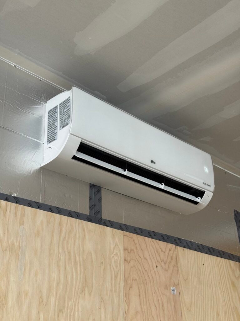 Wall-mounted LG ductless mini-split indoor unit installed in a Lone Tree, CO home during construction