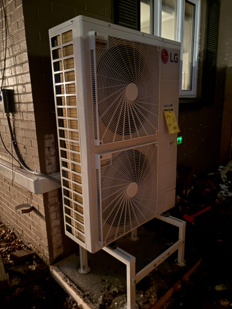 A night pictures of the LG RED ducted 3.5 ton condenser outside of our customer's home in Englewood CO