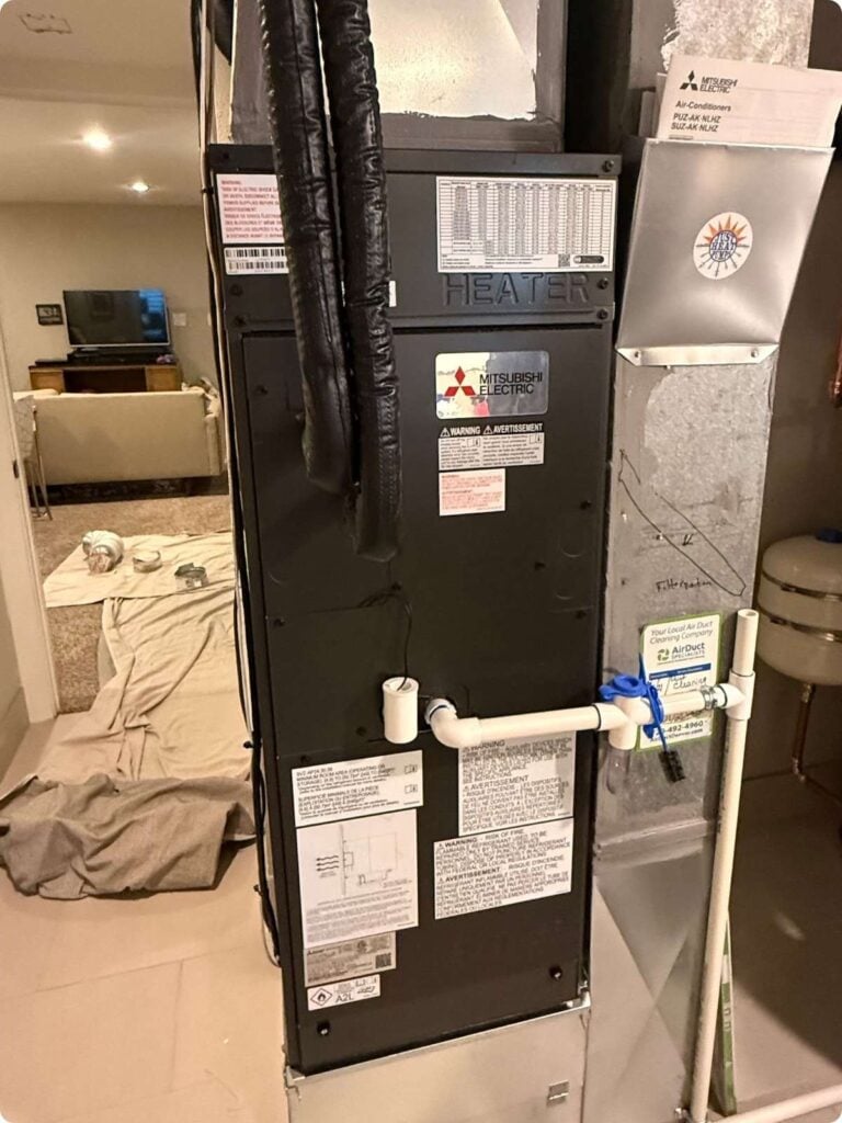 A Mitsubishi heat pump cold climate air handler installed in the basement of our Lakewood, CO's customer's home