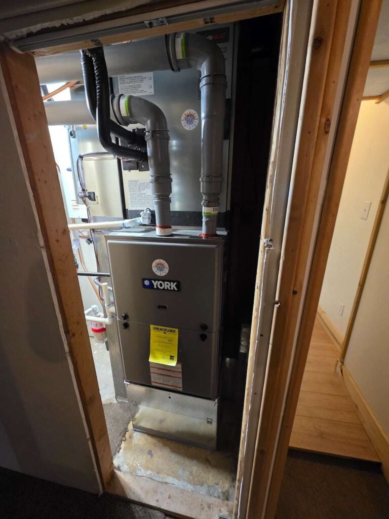 One of our Mitsubishi intelli-HEAT dual fual installations with a York high efficiency furnace in the basement of our customer's home.