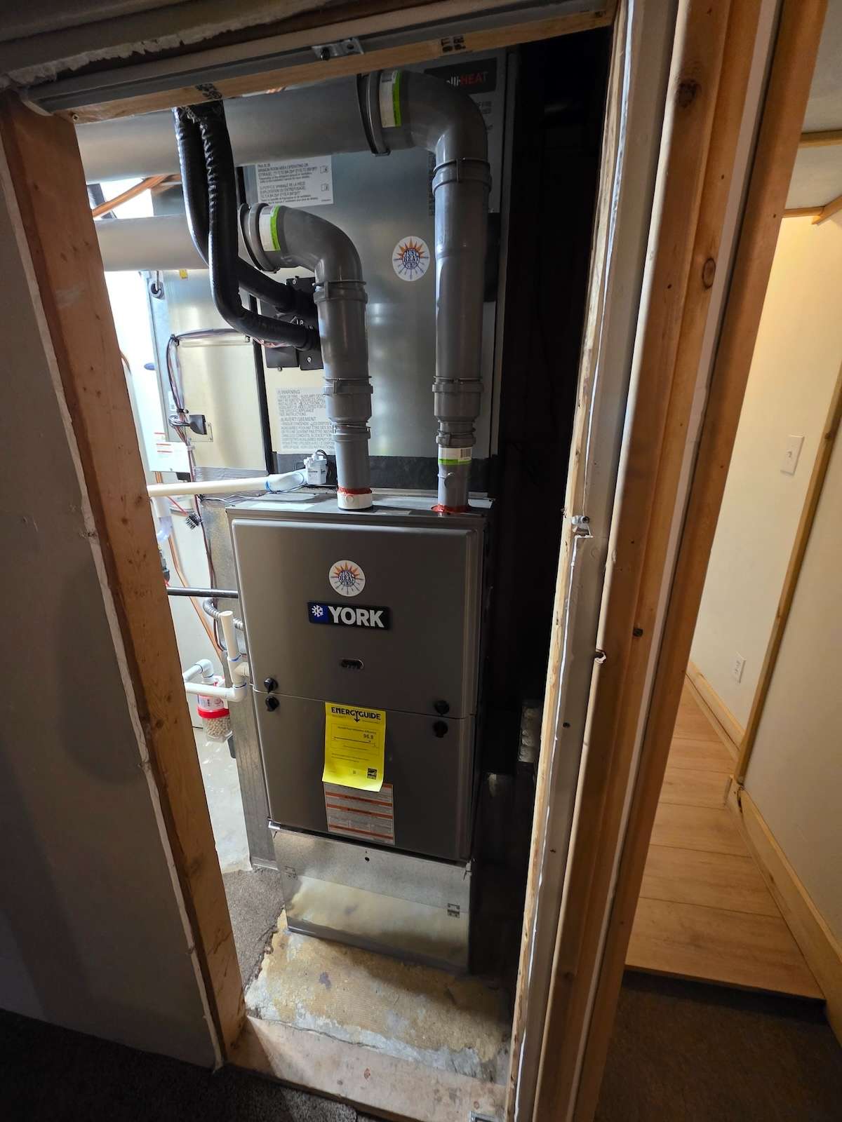 One of our Mitsubishi intelli-HEAT dual fual installations with a York high efficiency furnace in the basement of our customer's home.